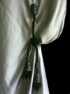 Curtain tie back dogon